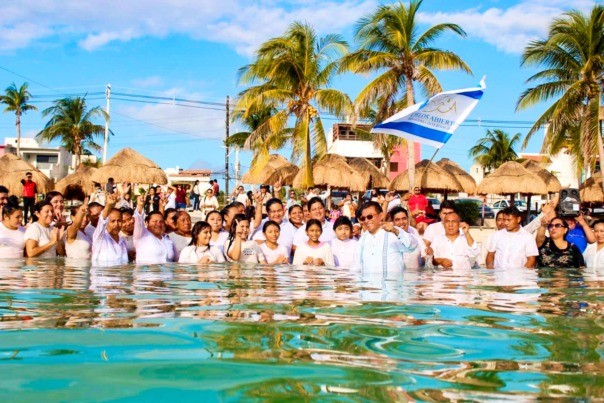 Bautizando en las playas de Cancún